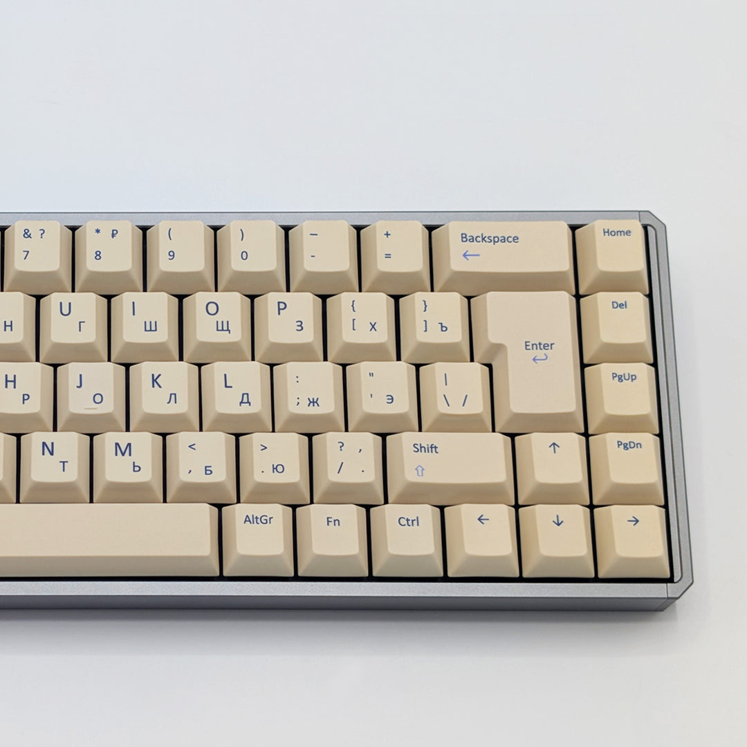 Close up of Beige QWERTY &amp; RUSSIAN PBT keycaps on a mechanical keyboard, featuring OEM profile keys with White, Cream, Beige and Off White Keycaps