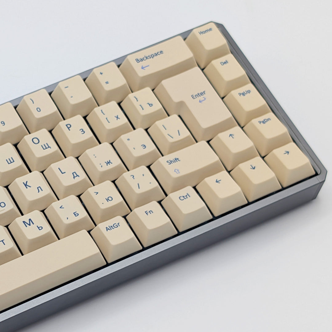 Side shot of Beige QWERTY &amp; RUSSIAN PBT keycaps on a mechanical keyboard, featuring OEM profile keys with White, Cream, Beige and Off White Keycaps