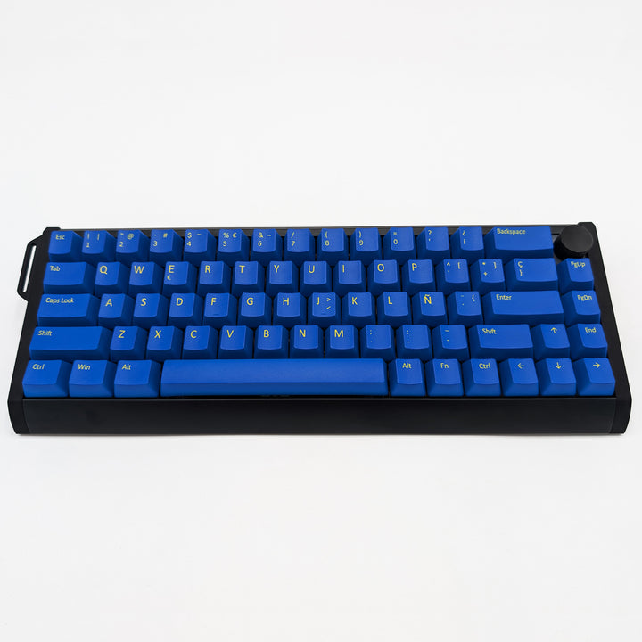 Customisable blue non-backlit QWERTY PBT keycaps with yellow legends on a mechanical keyboard, featuring OEM profile keys.