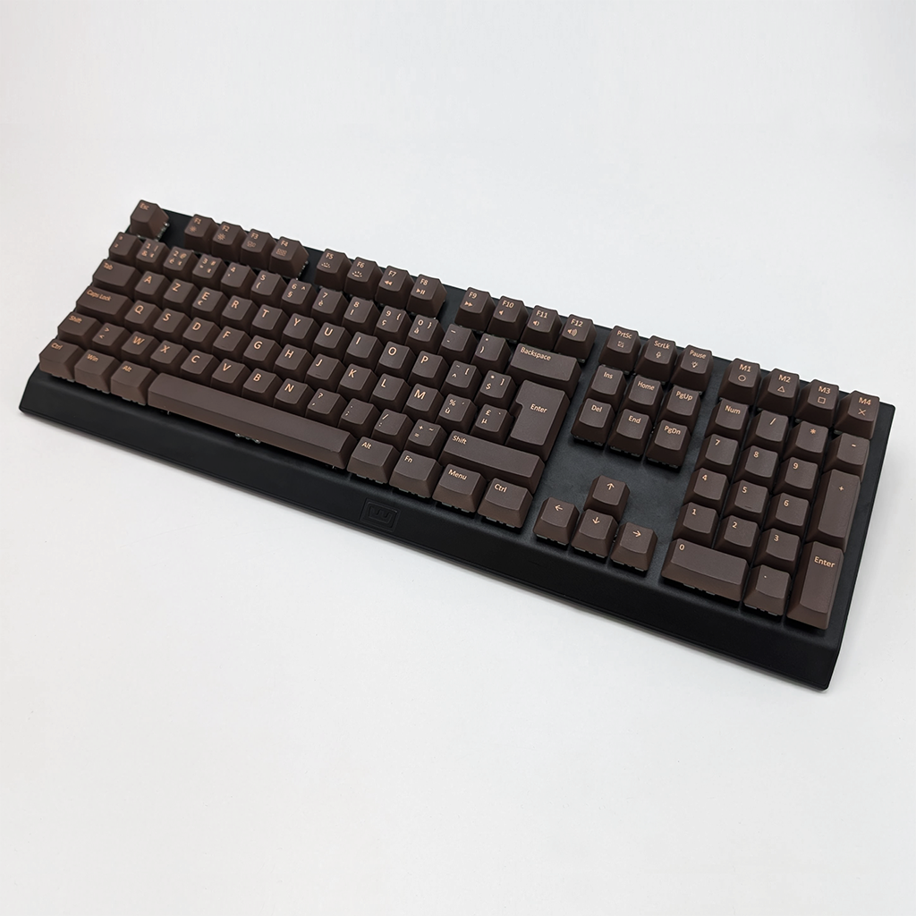 Brown AZERTY OEM profile PBT keycaps installed on a mechanical keyboard, showing non-backlit keys with dye-sublimated light brown legends.