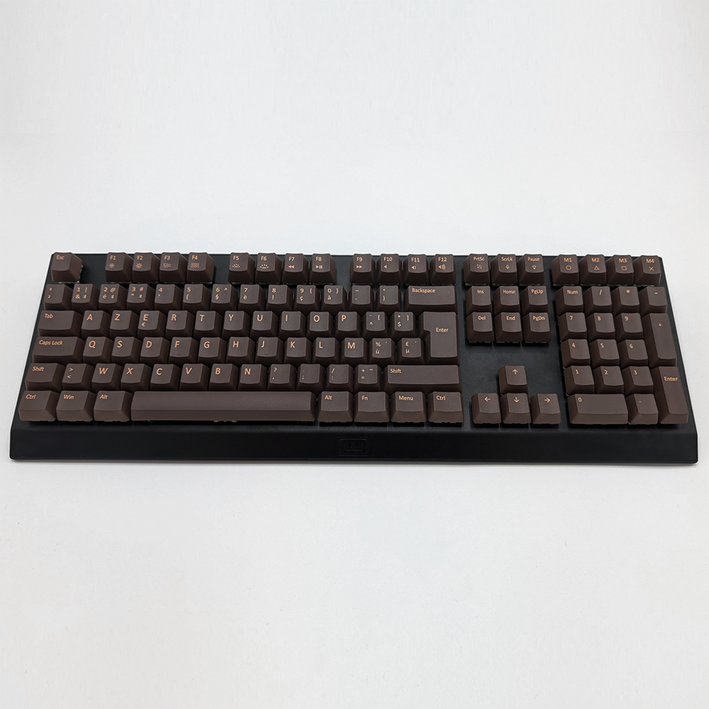 Customisable brown non-backlit PBT keycaps on a mechanical keyboard, featuring AZERTY OEM profile keys with light brown legends.