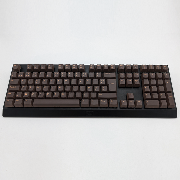 Customisable brown non-backlit PBT keycaps on a mechanical keyboard, featuring AZERTY OEM profile keys with light brown legends.