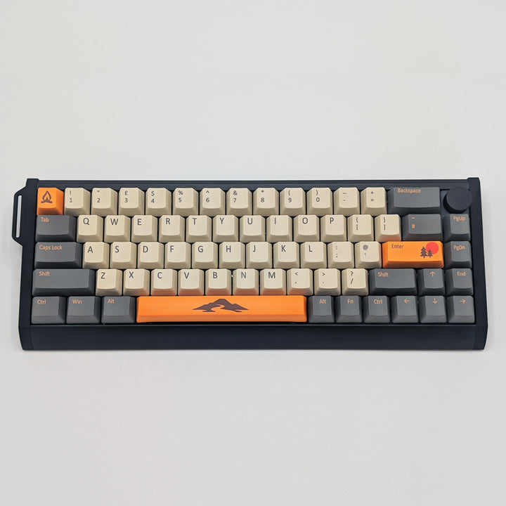 CAMPSITE QWERTY PBT keycaps on a mechanical keyboard, featuring OEM profile keys with Off-White/Cream, Grey and Orange Keycaps