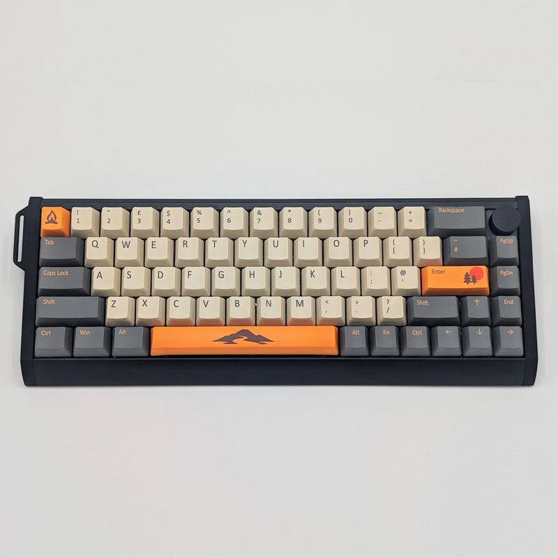 CAMPSITE QWERTY PBT keycaps on a mechanical keyboard, featuring OEM profile keys with Off-White/Cream, Grey and Orange Keycaps