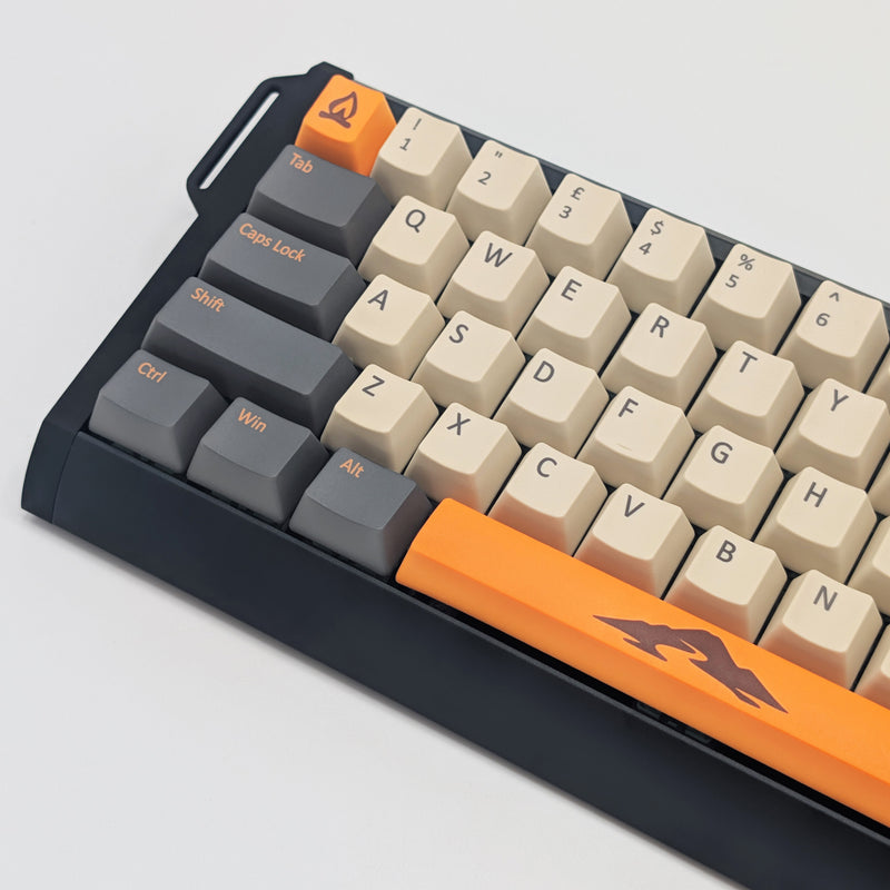 Side shot of CAMPSITE QWERTY PBT keycaps on a mechanical keyboard, featuring OEM profile keys with Off-White/Cream, Grey and Orange Keycaps