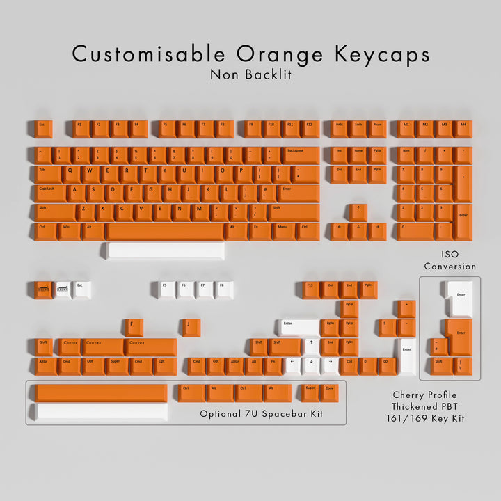 Set of customisable orange keycaps on a gray background