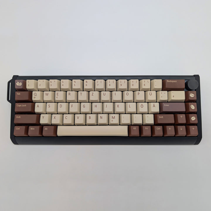 COFFEE QWERTZ PBT keycaps on a mechanical keyboard, featuring OEM profile keys with Off-White/Beige, Brown and Light Brown Keycaps