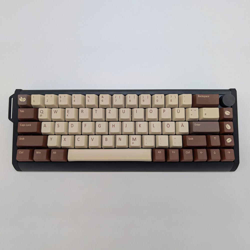 COFFEE QWERTZ PBT keycaps on a mechanical keyboard, featuring OEM profile keys with Off-White/Beige, Brown and Light Brown Keycaps
