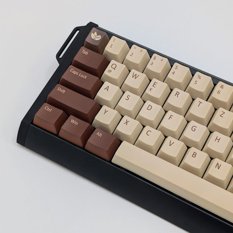 COFFEE QWERTZ PBT keycaps on a mechanical keyboard, featuring OEM profile keys with Off-White/Beige, Brown and Light Brown Keycaps
