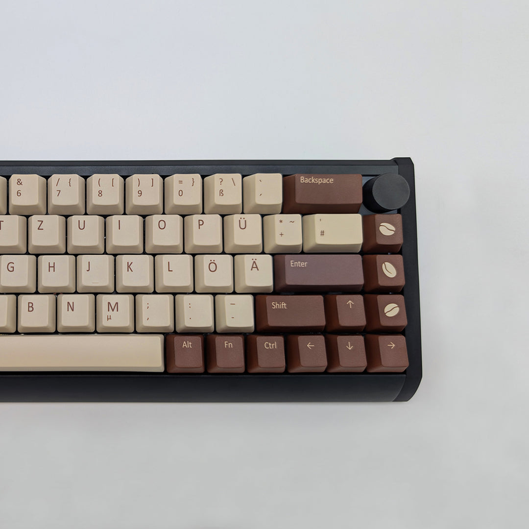 COFFEE QWERTZ PBT keycaps on a mechanical keyboard, featuring OEM profile keys with Off-White/Beige, Brown and Light Brown Keycaps