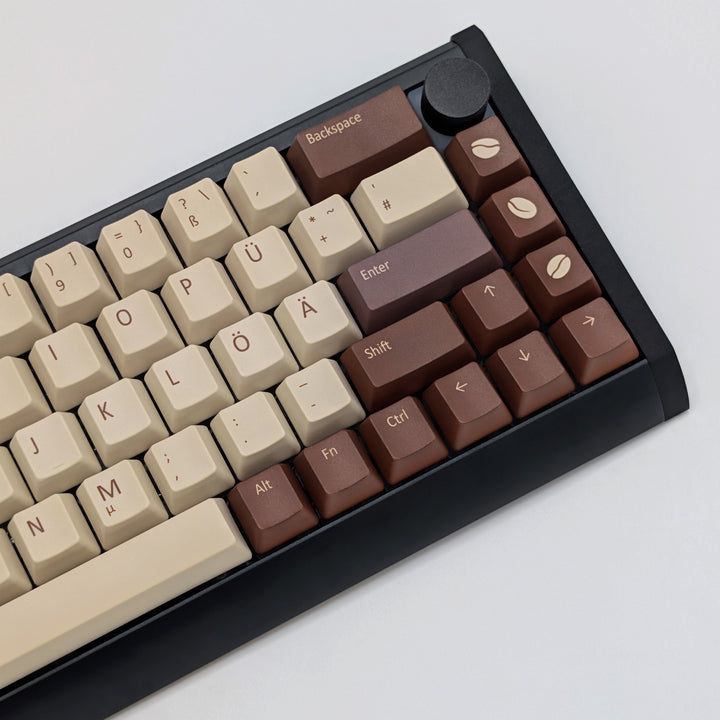 COFFEE QWERTZ PBT keycaps on a mechanical keyboard, featuring OEM profile keys with Off-White/Beige, Brown and Light Brown Keycaps