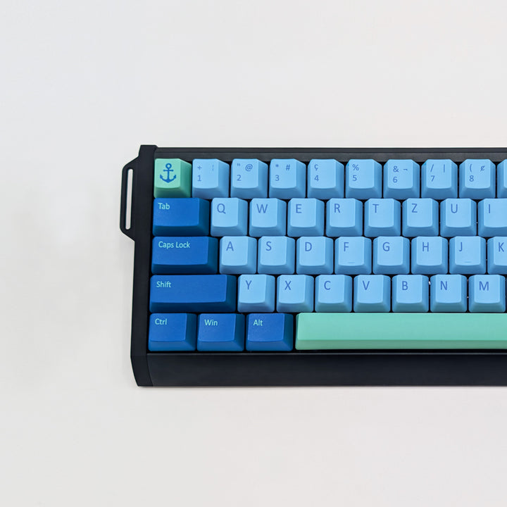 DEEP SEA QWERTZ PBT keycaps on a mechanical keyboard, featuring OEM profile keys with Light Blue, Blue and Mint Green Keycaps