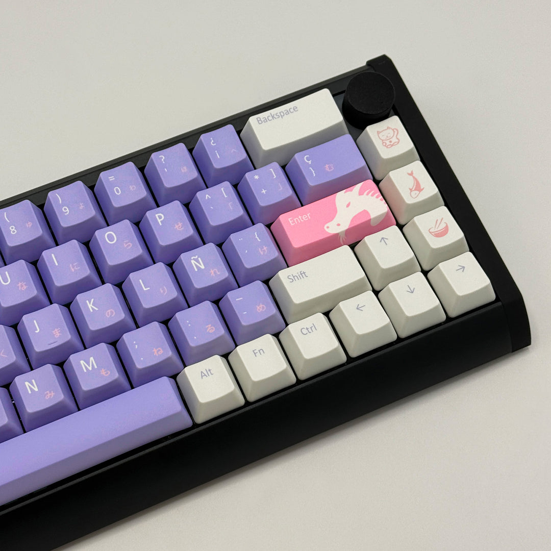 ENTER JAPAN QWERTY PBT keycaps on a mechanical keyboard, featuring OEM profile keys with Purple, White and Pink Keycaps