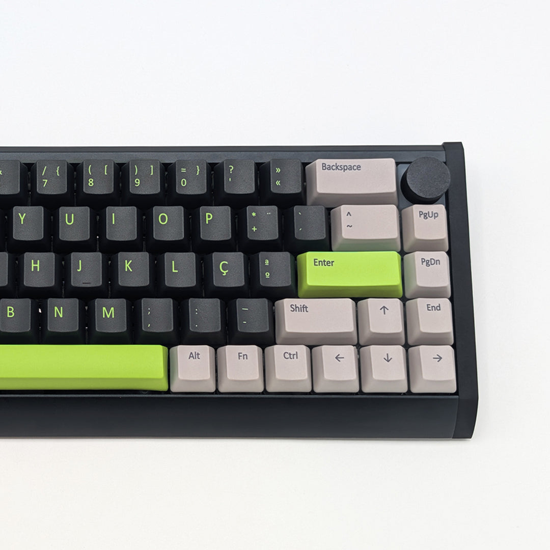 Close-up of GREEN MACHINE QWERTY PBT keycaps on a mechanical keyboard, featuring OEM profile keys with Grey/Black/Charcoal, Grey and Green Keycaps