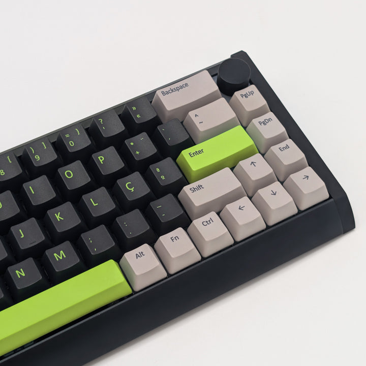 Side shot of GREEN MACHINE QWERTY PBT keycaps on a mechanical keyboard, featuring OEM profile keys with Grey/Black/Charcoal, Grey and Green Keycaps