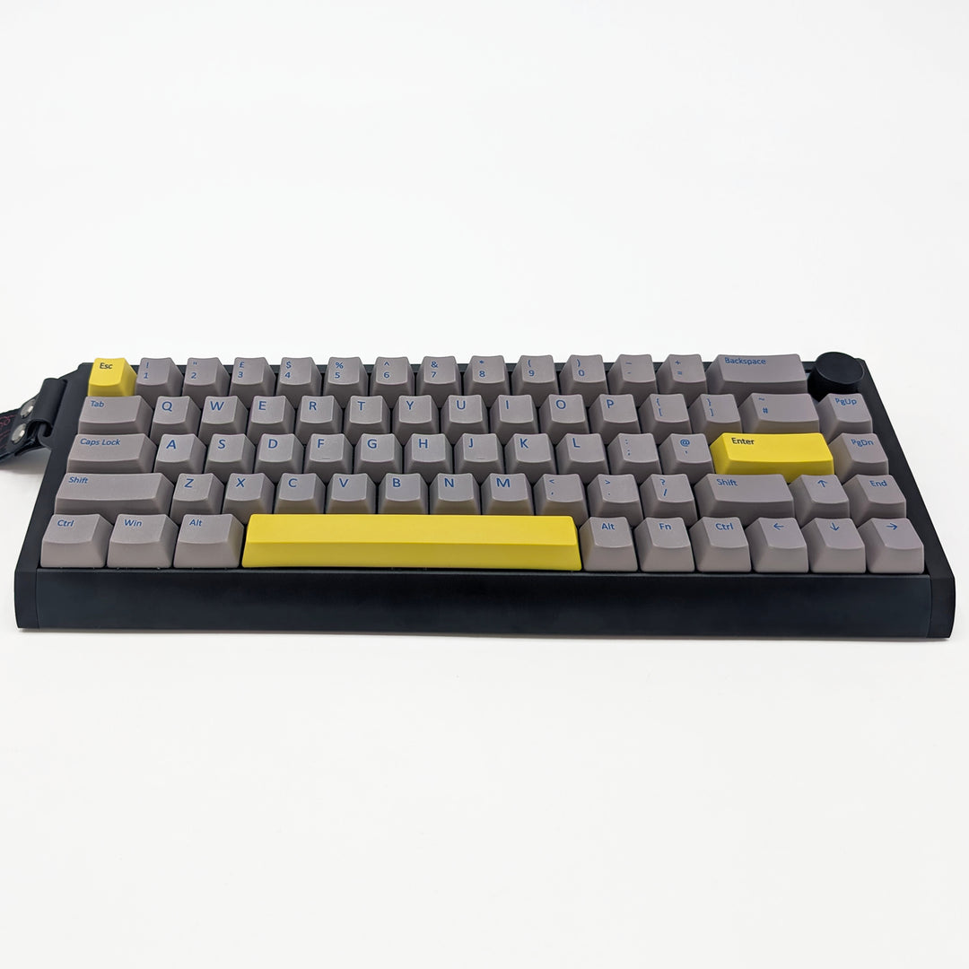 Customisable light grey non-backlit QWERTY PBT keycaps with blue legends on a mechanical keyboard, featuring OEM profile keys.