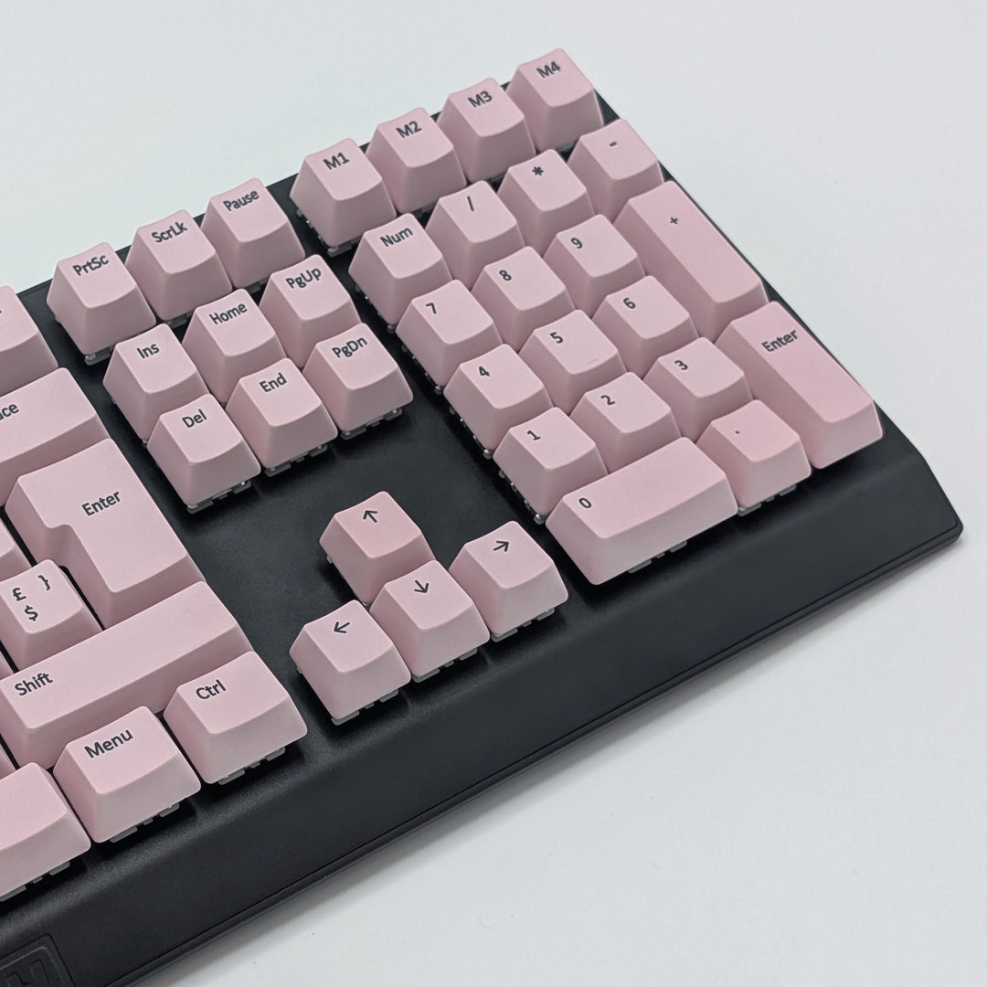 Mechanical keyboard fitted with customisable Light Pink QWERTZ PBT keycaps, non-backlit OEM profile with black legends and ISO-compatible layout.