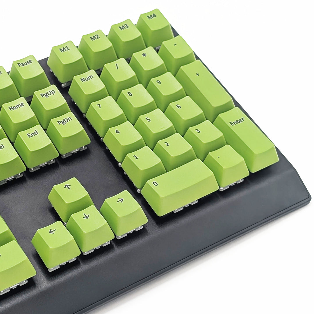Mechanical keyboard fitted with customisable light green AZERTY PBT keycaps, non-backlit OEM profile with black legends and ISO-compatible layout.