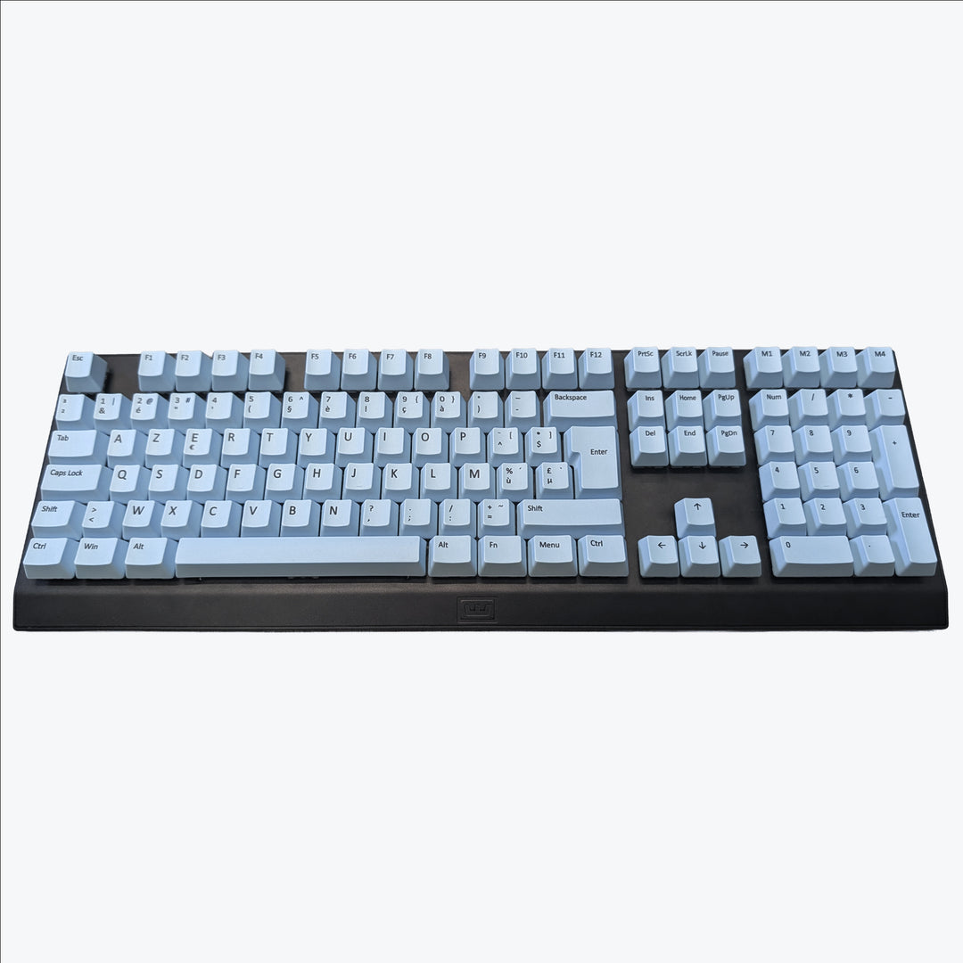 Customisable light blue non-backlit AZERTY PBT keycaps with black legends on a mechanical keyboard, featuring OEM profile keys.
