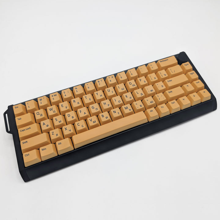 Light Orange OEM profile QWERTY PBT keycaps on a mechanical keyboard, showing non-backlit keys with dye-sublimated black legends.