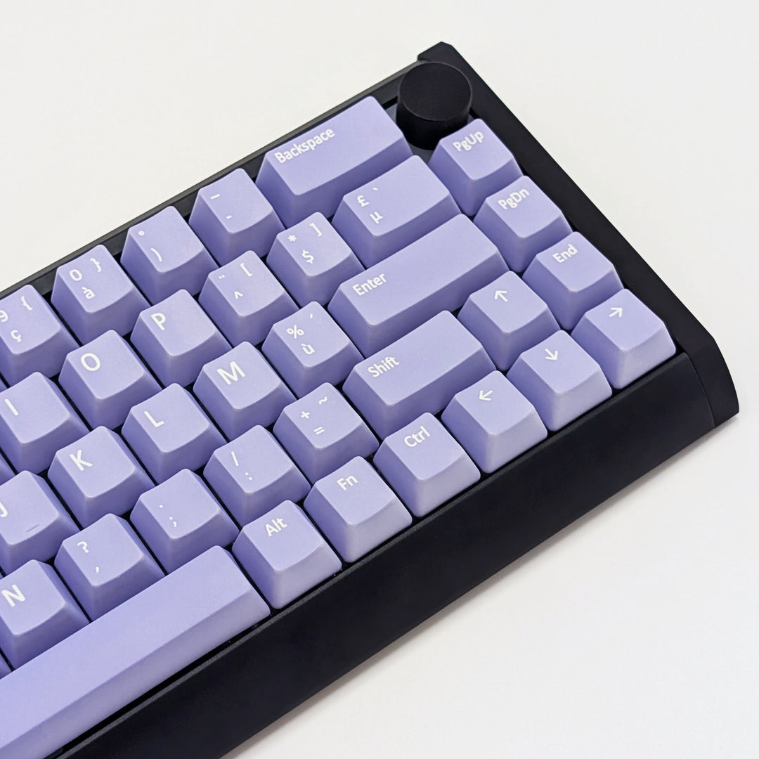 Mechanical keyboard fitted with customisable Light Purple AZERTY PBT keycaps, non-backlit OEM profile with white legends and ANSI-compatible layout.
