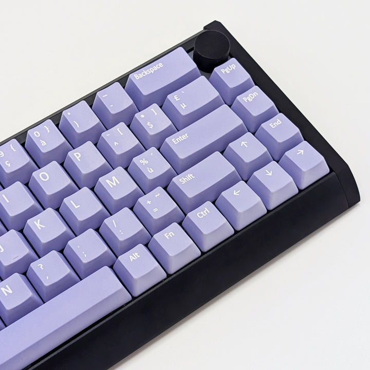 Mechanical keyboard fitted with customisable Light Purple AZERTY PBT keycaps, non-backlit OEM profile with white legends and ANSI-compatible layout.