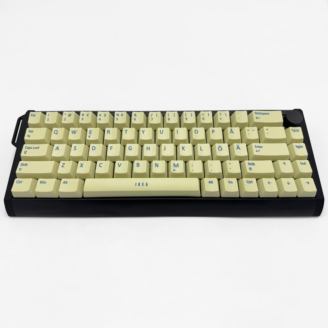 Customisable Light Yellow non-backlit QWERTY PBT keycaps with blue legends on a mechanical keyboard, featuring OEM profile keys.