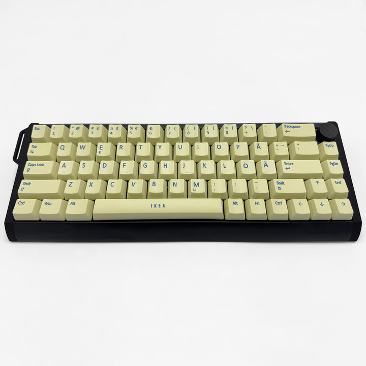 Customisable Light Yellow non-backlit QWERTY PBT keycaps with blue legends on a mechanical keyboard, featuring OEM profile keys.
