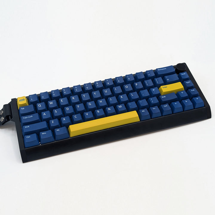 Navy ANSI OEM profile QWERTY PBT keycaps with matte finish installed on a mechanical keyboard, showing non-backlit keys with dye-sublimated white legends.