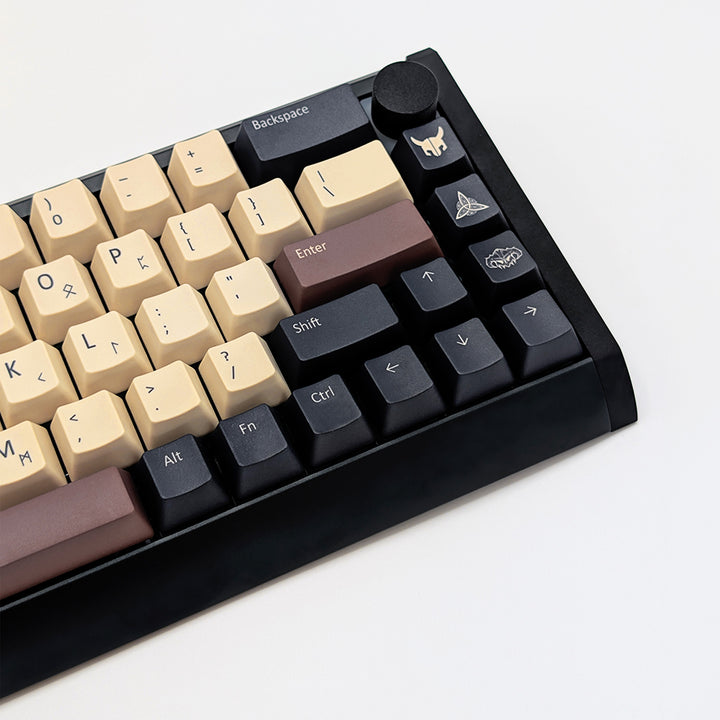 NORDIC QWERTY PBT keycaps on a mechanical keyboard, featuring OEM profile keys with Off-White/Beige, Charcoal Grey and Brown Keycaps