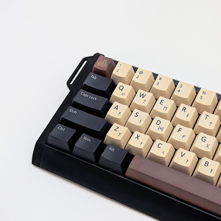 NORDIC QWERTY PBT keycaps on a mechanical keyboard, featuring OEM profile keys with Off-White/Beige, Charcoal Grey and Brown Keycaps