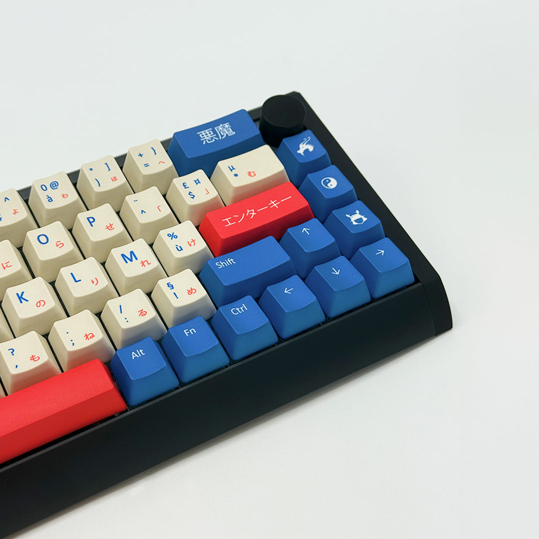 ONI AZERTY PBT keycaps on a mechanical keyboard, featuring OEM profile keys with Off-White/Beige, Red and Blue Keycaps
