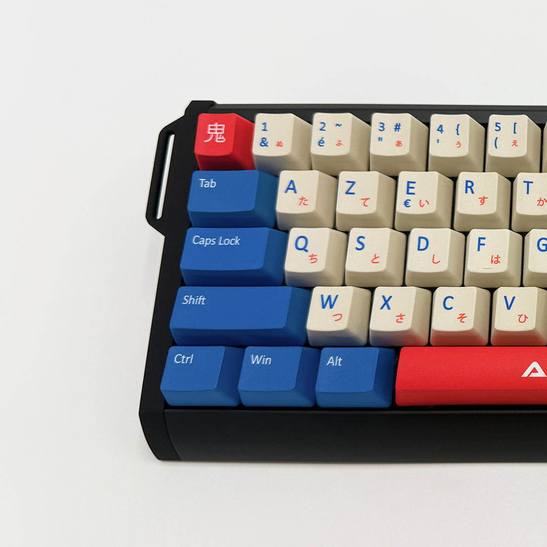 ONI AZERTY PBT keycaps on a mechanical keyboard, featuring OEM profile keys with Off-White/Beige, Red and Blue Keycaps