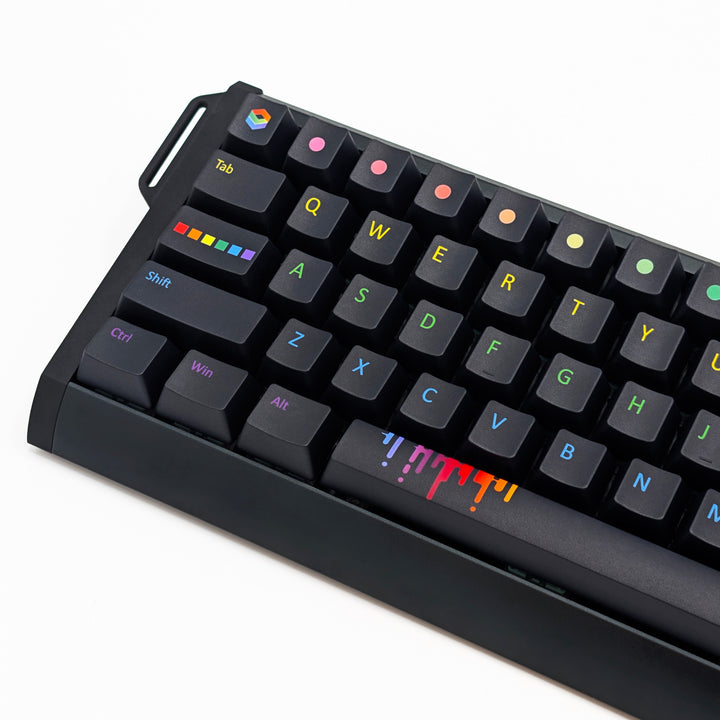 Side shot of PAINTWORKS QWERTY PBT keycaps on a mechanical keyboard, featuring OEM profile keys with Black Keycaps and Rainbow Text