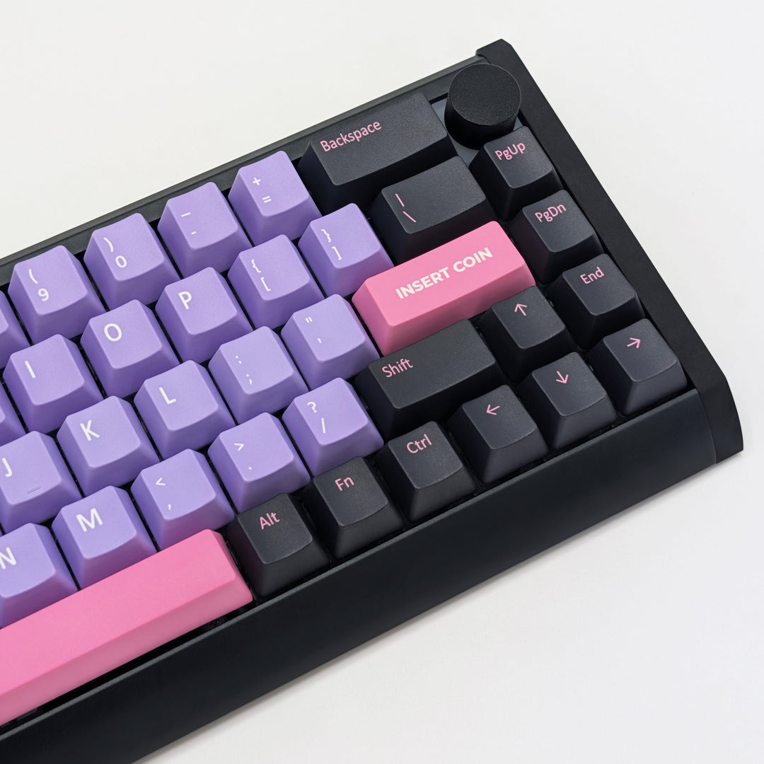 Side shot of RETRO QWERTY PBT keycaps on a mechanical keyboard, featuring OEM profile keys with Purple, Grey and Pink Keycaps