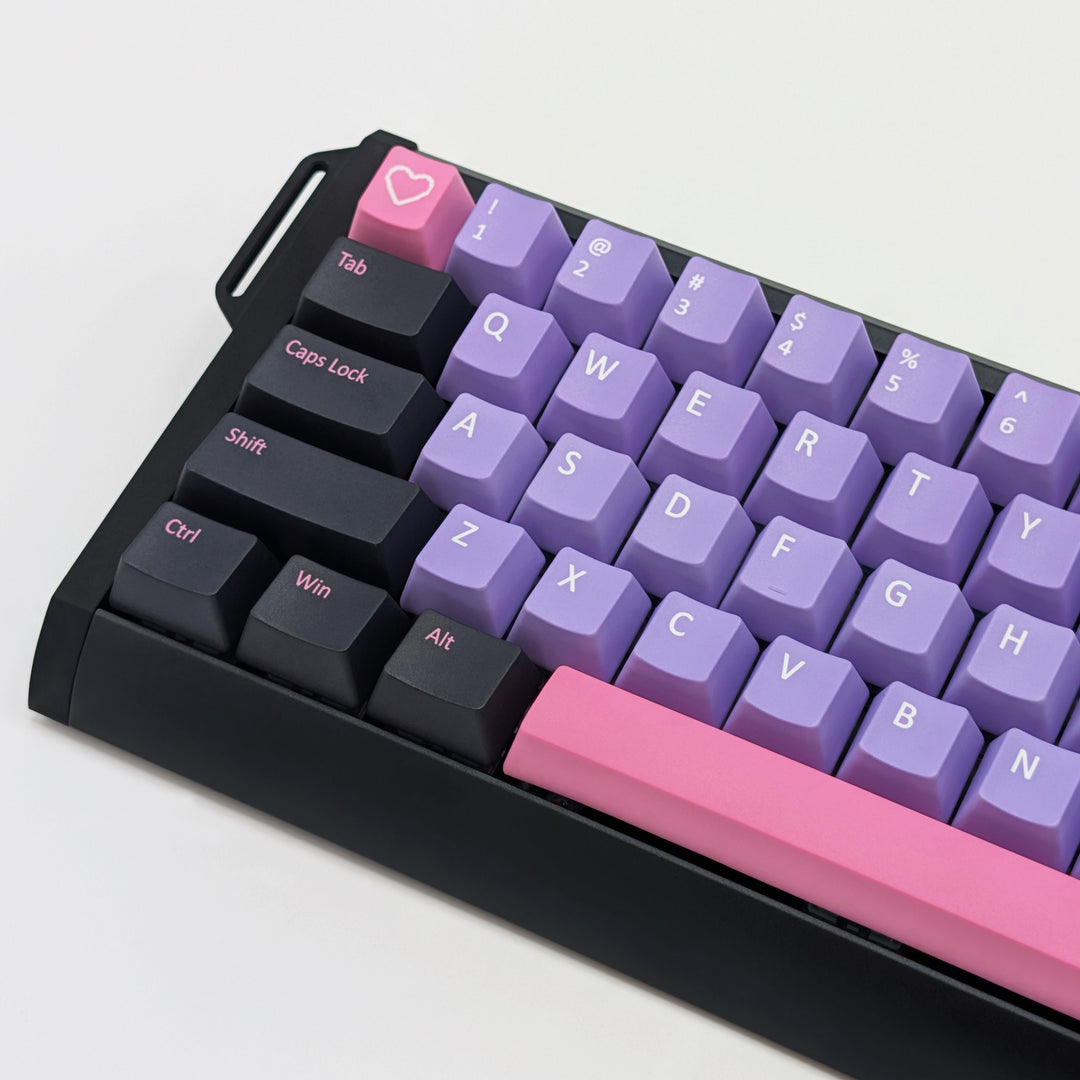 Side shot of RETRO QWERTY PBT keycaps on a mechanical keyboard, featuring OEM profile keys with Purple, Grey and Pink Keycaps