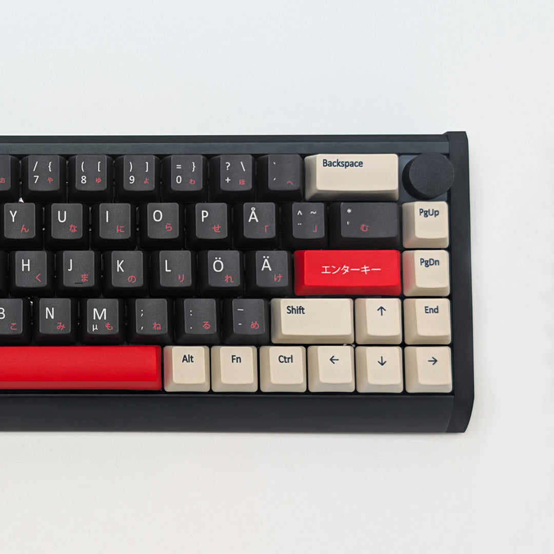 Close up of QWERTY PBT keycaps on a mechanical keyboard, featuring OEM profile keys with Grey, Off White and Red Keycaps