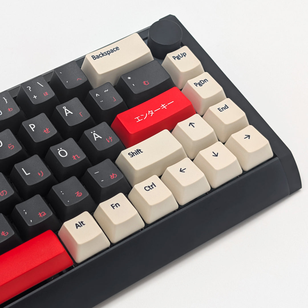 Side shot of QWERTY PBT keycaps on a mechanical keyboard, featuring OEM profile keys with Grey, Off White and Red Keycaps