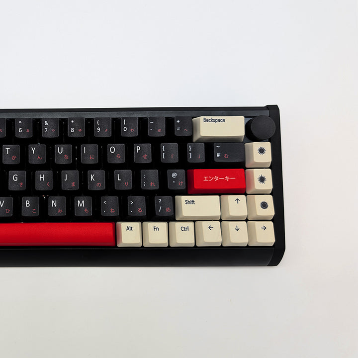 RISING SUN QWERTY PBT keycaps on a mechanical keyboard, featuring OEM profile keys with Off-White/Beige, Black and Red Keycaps
