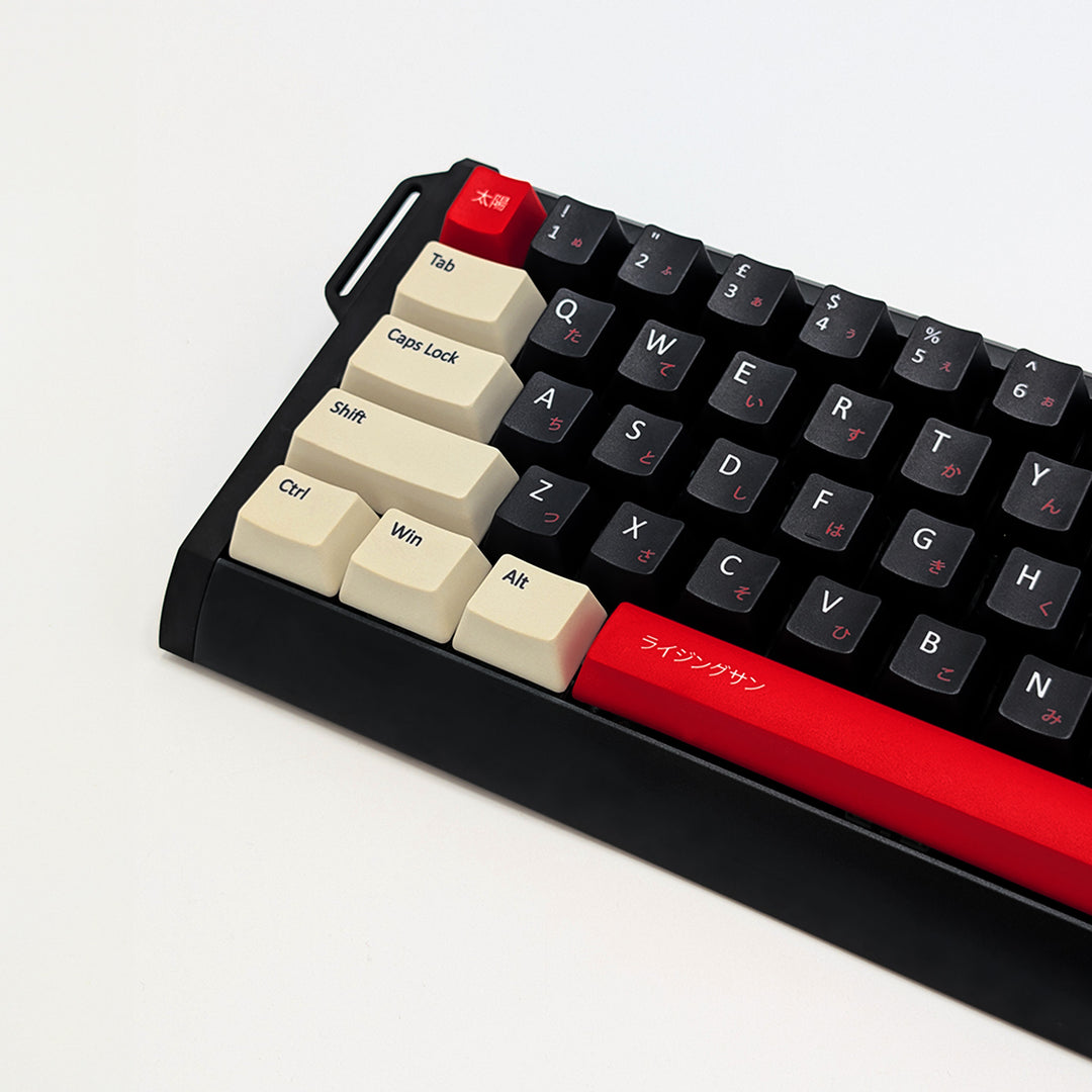 RISING SUN QWERTY PBT keycaps on a mechanical keyboard, featuring OEM profile keys with Off-White/Beige, Black and Red Keycaps