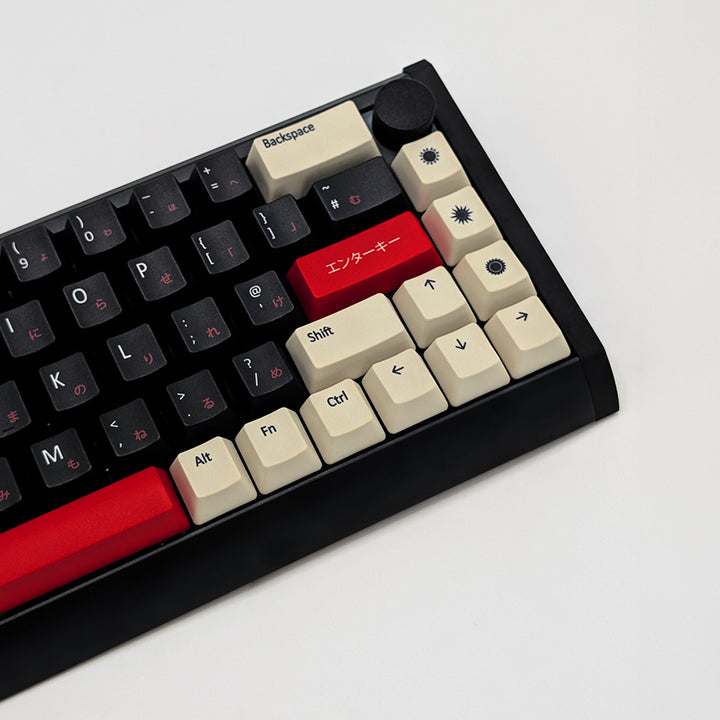 RISING SUN QWERTY PBT keycaps on a mechanical keyboard, featuring OEM profile keys with Off-White/Beige, Black and Red Keycaps