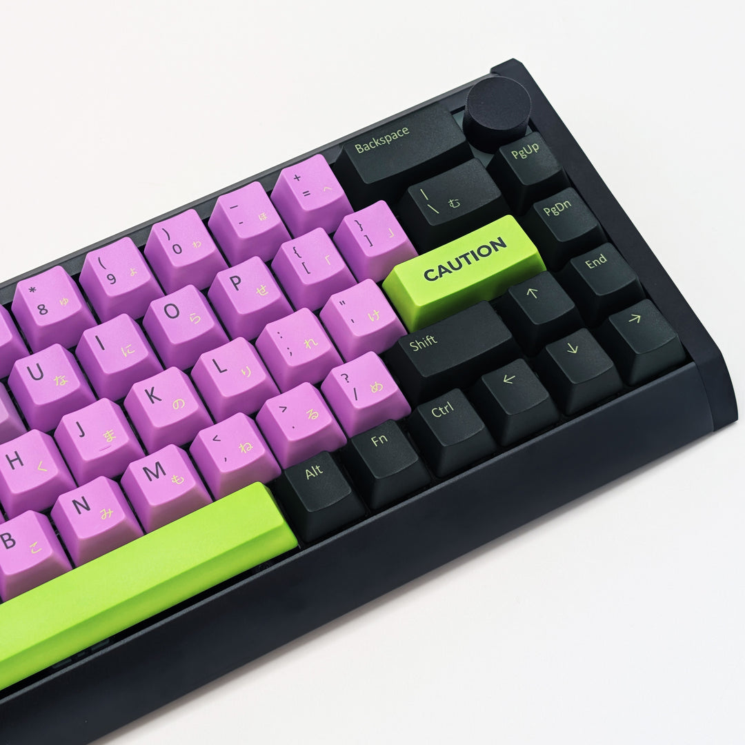 Side shot of VOID QWERTY PBT keycaps on a mechanical keyboard, featuring OEM profile keys with Grey, Purple and Green Keycaps
