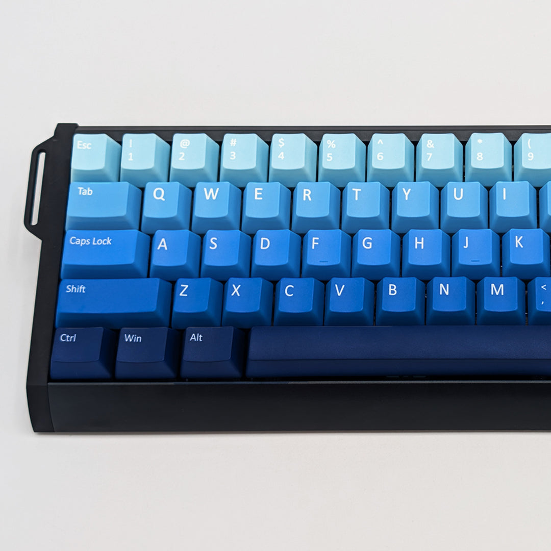 Close-up of WATER QWERTY PBT keycaps on a mechanical keyboard, featuring OEM profile keys with Blue Gradient Colouring