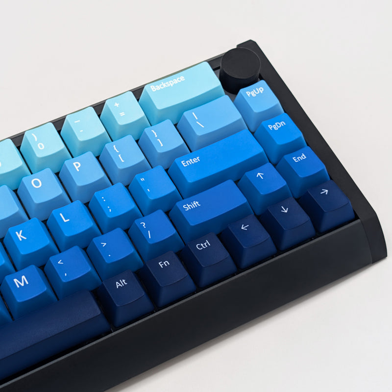Side shot of WATER QWERTY PBT keycaps on a mechanical keyboard, featuring OEM profile keys with Blue Gradient Colouring