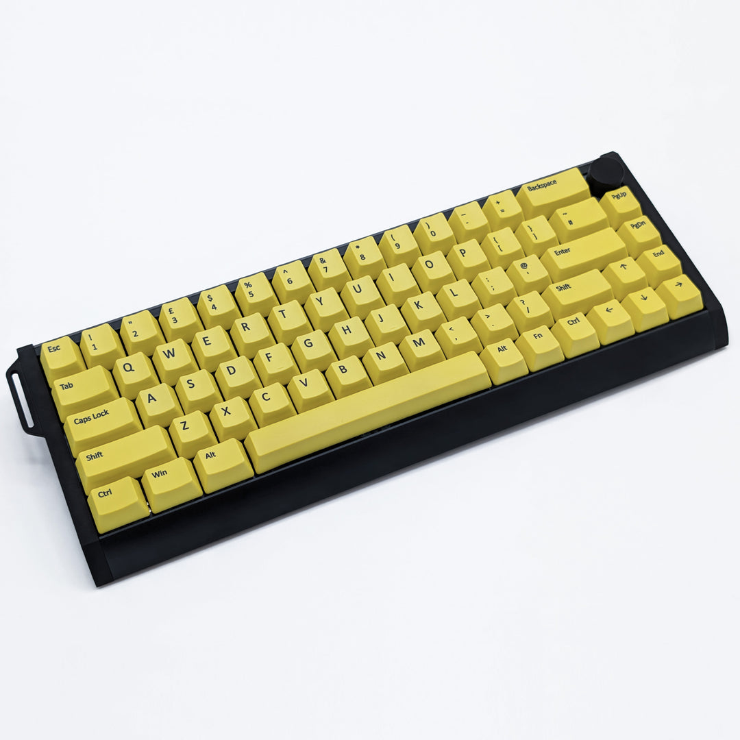 Side view of Customisable Yellow non-backlit QWERTY PBT keycaps with black legends on a mechanical keyboard, featuring OEM profile keys.