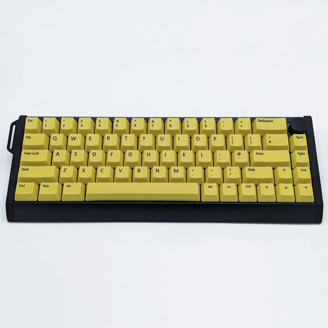 Customisable Yellow non-backlit QWERTY PBT keycaps with black legends on a mechanical keyboard, featuring OEM profile keys.