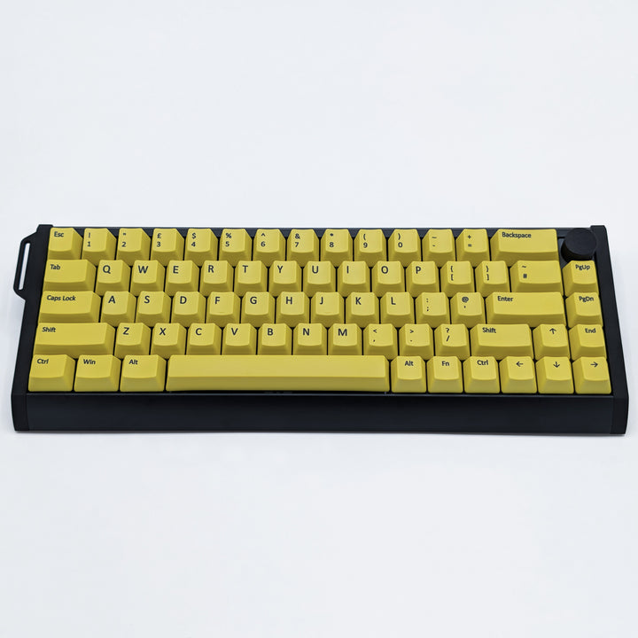 Customisable Yellow non-backlit QWERTY PBT keycaps with black legends on a mechanical keyboard, featuring OEM profile keys.